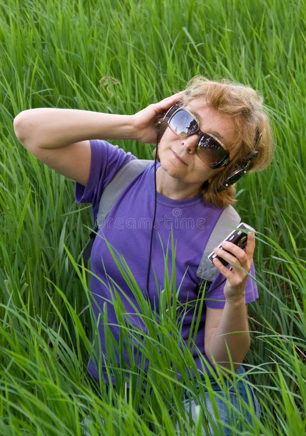 Woman listening to music with headphones