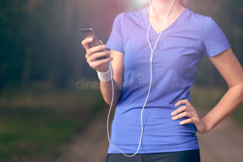 Woman listening to music on an MP3 player