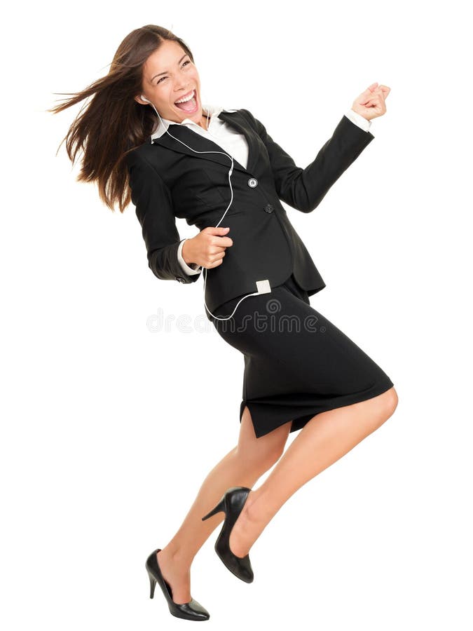 Woman listening to music on mp3 player, dancing playing air guitar. Funny happy portrait of business woman isolated on white background in full length. Woman listening to music on mp3 player, dancing playing air guitar. Funny happy portrait of business woman isolated on white background in full length.