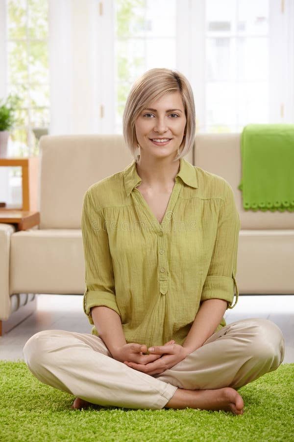 Woman on living room floor royalty free stock image Woman on living room floor royalty free stock image