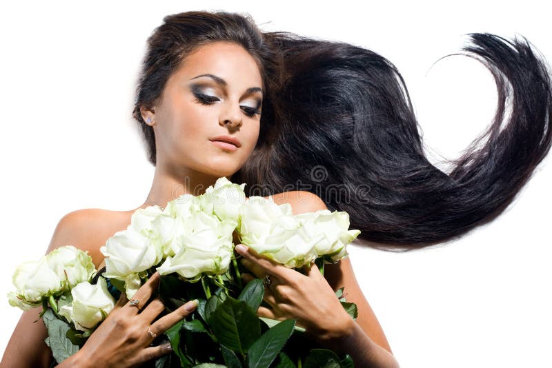 Woman with long hair and roses