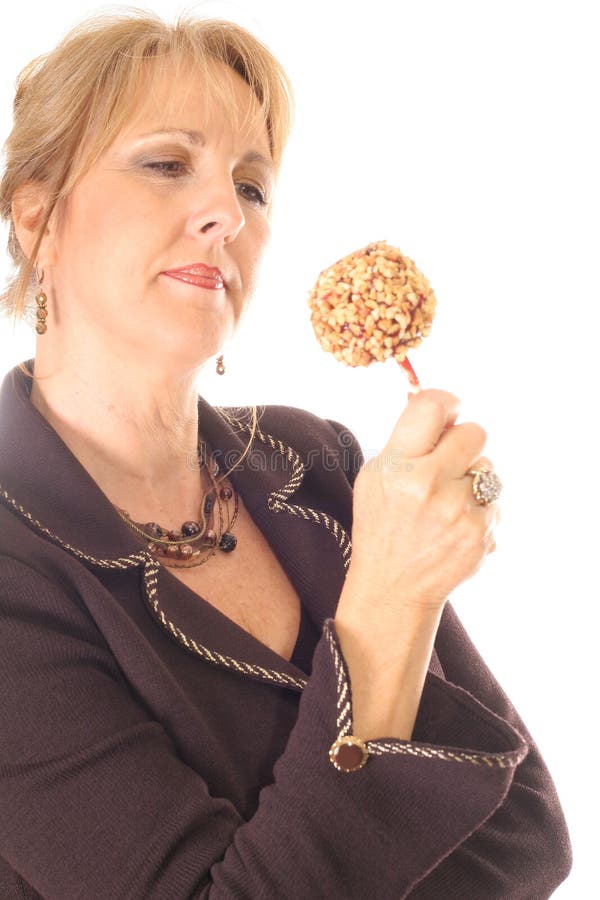 Woman looking at candy apple