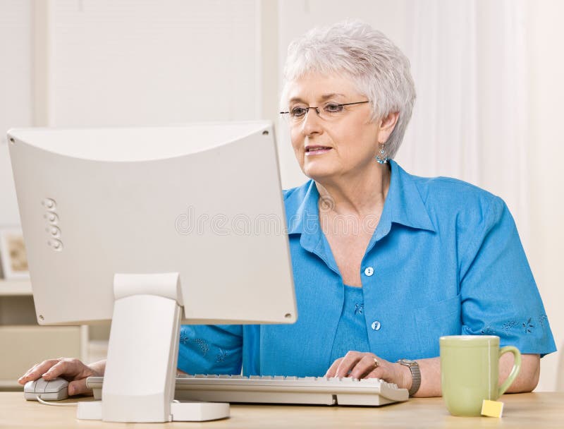 Woman looking at computer monitor