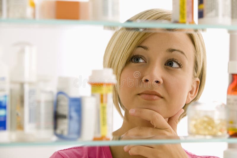 Woman Looking in Medicine Stock Image Image of pharmaceutical