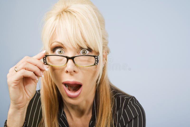 Woman Looking Over Her Glasses Stock Photo Image of face, eyes 5567452
