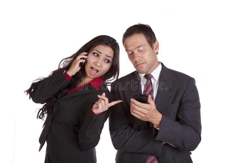 Woman looking over shoulder pointing at phone