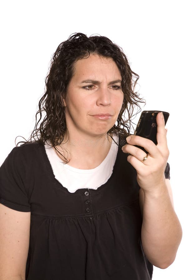 Woman looking at phone confused