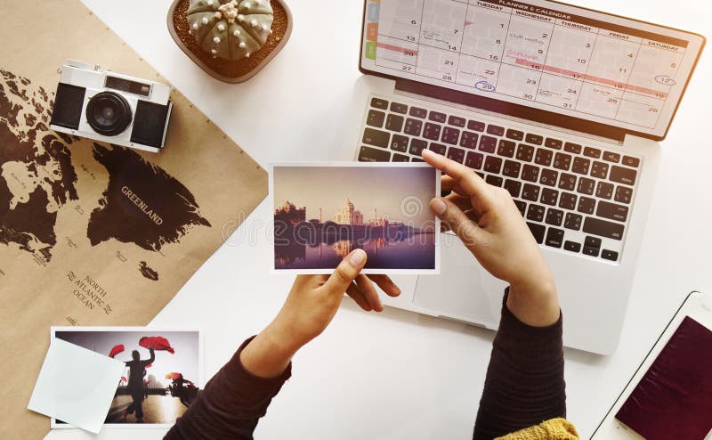 Woman Looking Photos Hands Travel Map Concept royalty free stock image Woman Looking Photos Hands Travel Map Concept royalty free stock image