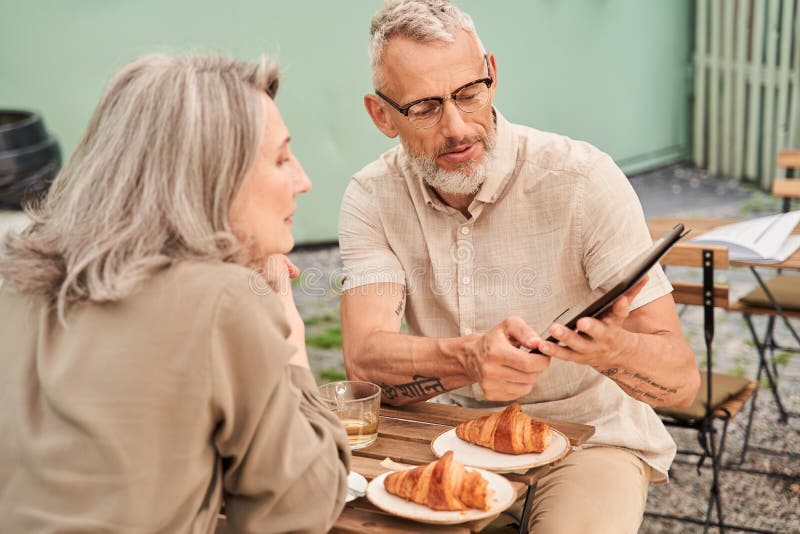 Wife Telling Husband About Her Date