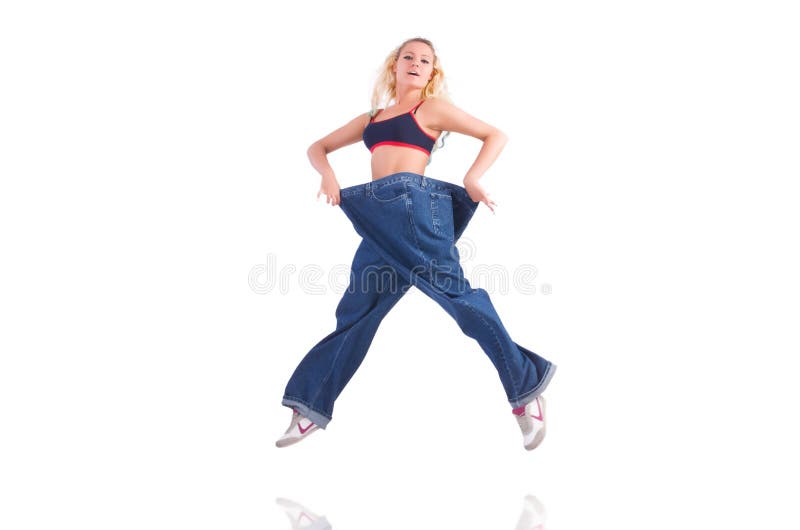 Woman loosing weight isolated on white royalty free stock photo Woman loosing weight isolated on white royalty free stock photo