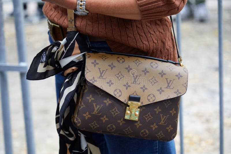 Woman with Louis Vuitton Bag and Chanel Scarf before Fendi Fashion Show, Milan Fashion Week Editorial Photography - Image of outdoor, style: 194224047 Woman with Louis Vuitton Bag and Chanel Scarf before Fendi Fashion Show, Milan Fashion Week Editorial Photography - Image of outdoor, style: 194224047