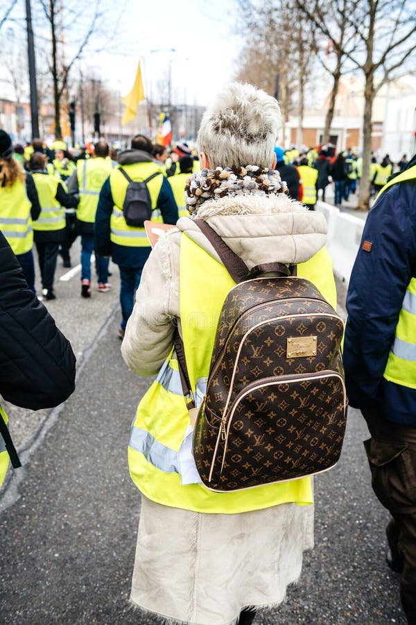 Woman With Luxury Louis Vuitton Backpack At Yellow Vests Protest Editorial Stock Photo - Image ...