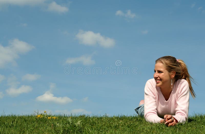 Woman lying on the grass