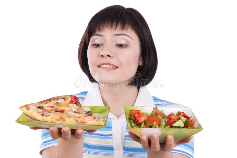 Woman makes choice of pizza and healthy salad