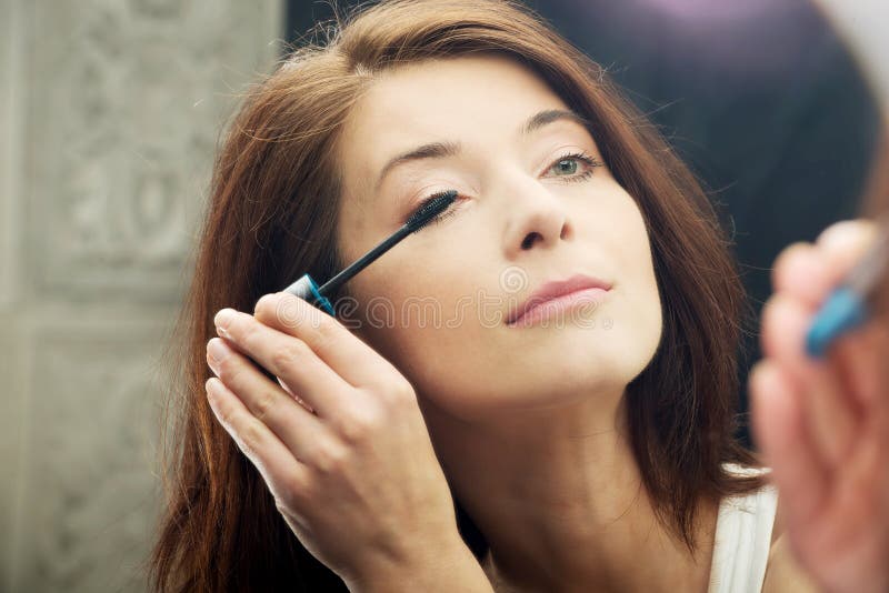 Woman Makes Light Day Makeup in Bathroom. Stock Image Image of home, cosmetics 54837389