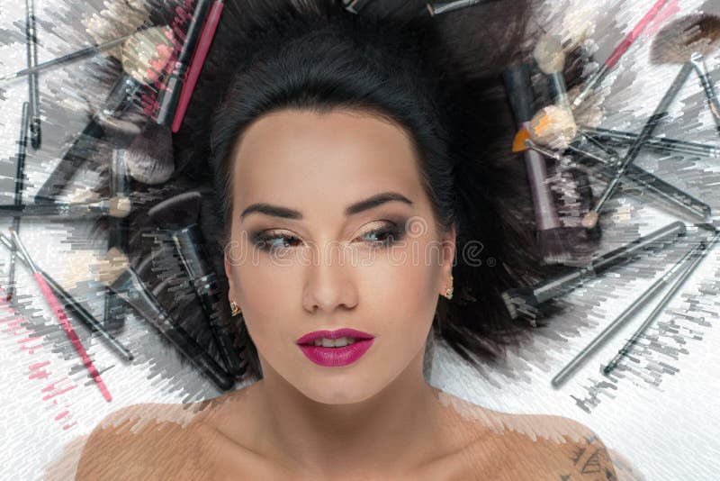 woman with makeup in the brushes for makeup royalty free stock image woman with makeup in the brushes for makeup royalty free stock image