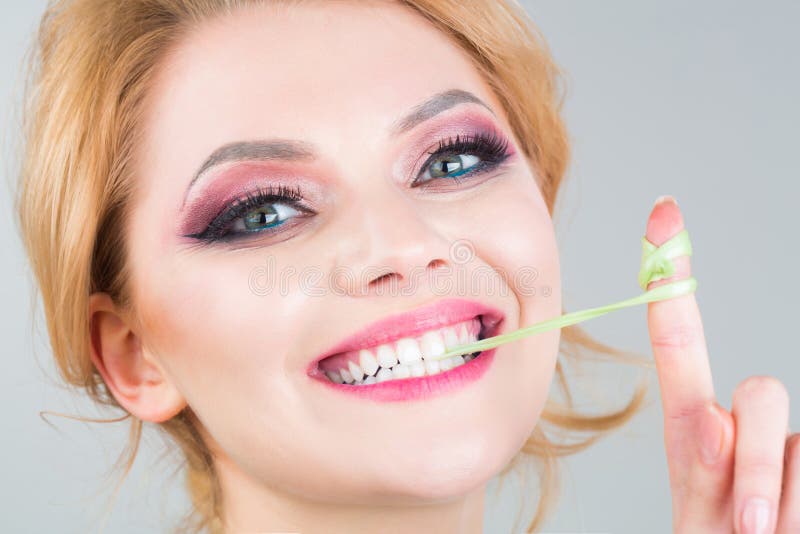 Woman makeup, bubblegum, gum. Makeup beauty and eye make up. Portrait smile girl. Beautiful woman, beauty female. Bubble stock photography Woman makeup, bubblegum, gum. Makeup beauty and eye make up. Portrait smile girl. Beautiful woman, beauty female. Bubble stock photography
