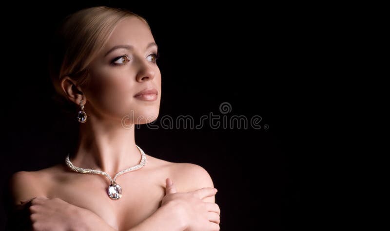 Woman with makeup in luxury jewelry