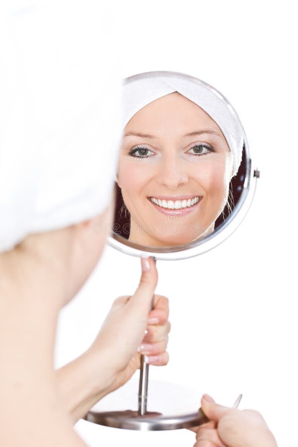 Woman makeup in mirror