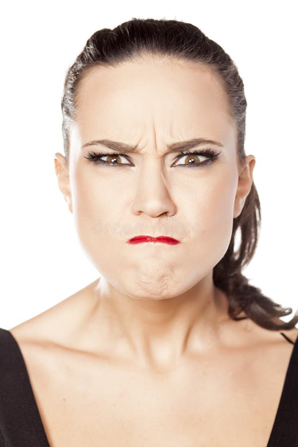 Woman making angry face stock photo. Image of kneel, equipment - 68417716