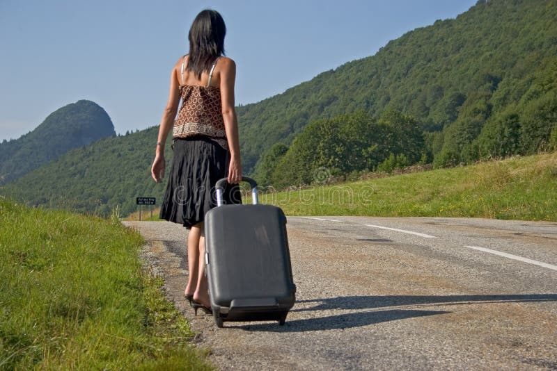 Woman making of hitch-hiking