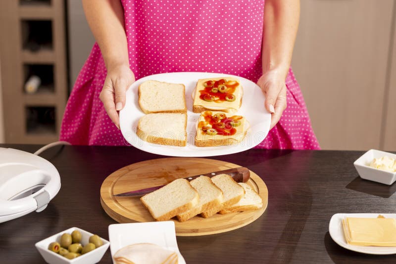 Woman Making Hot Sandwiches Stock Image - Image of female, domestic