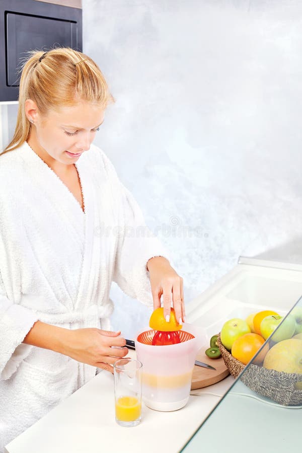 Woman Making Morning Juice in Kitchen Stock Photo Image of pretty