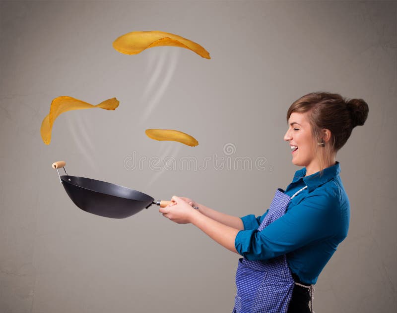 Woman making pancakes stock photo. Image of culinary 40183778