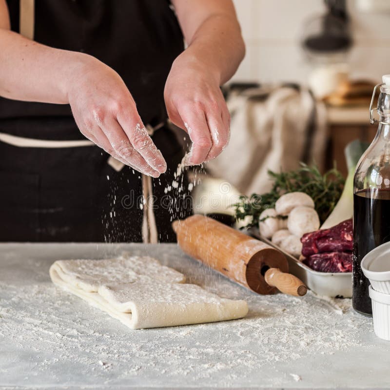 A Woman Making Puff Pastry Dough stock photos A Woman Making Puff Pastry Dough stock photos
