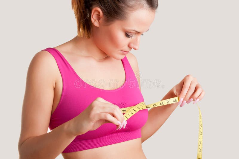 Woman Measuring Up Her Chest