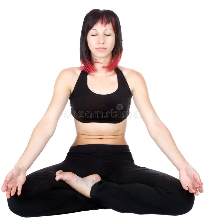 Woman meditating sitting in a yoga position