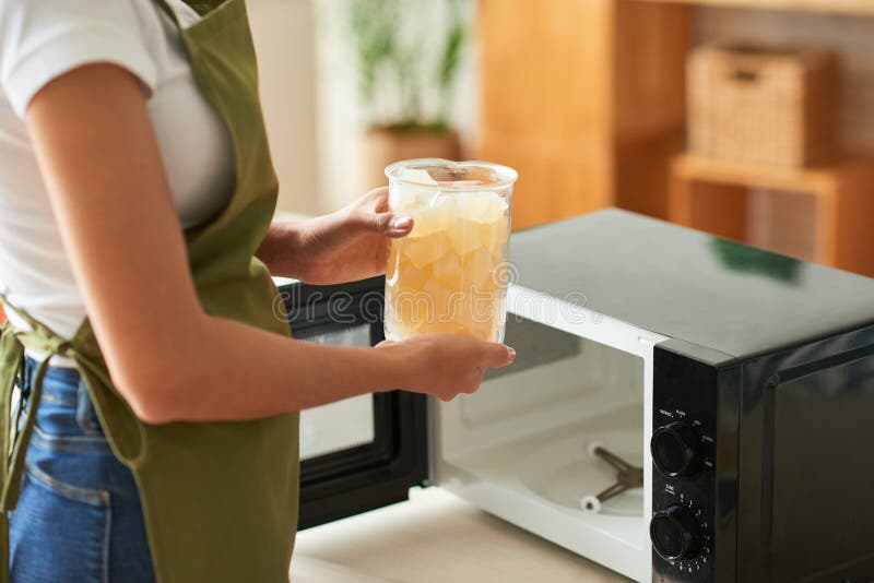 Woman Melting Soap Base stock image. Image of kitchen 227480657