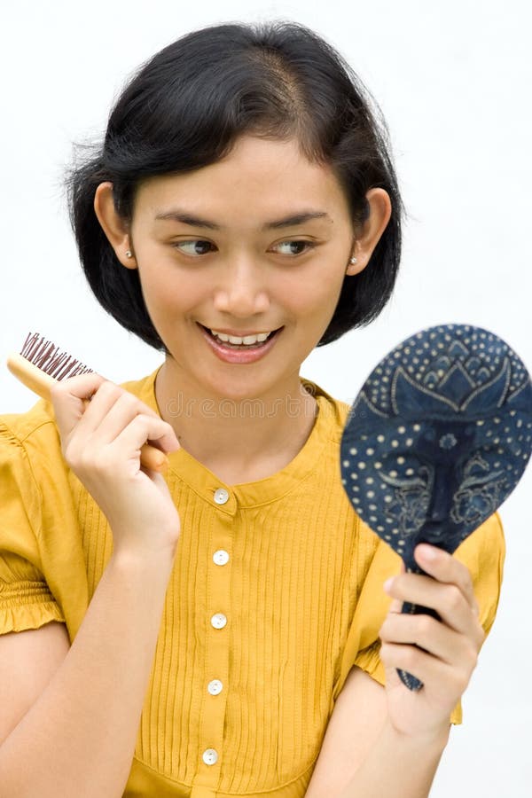 Woman With Mirror And Hairbrush Picture. Image 10086476