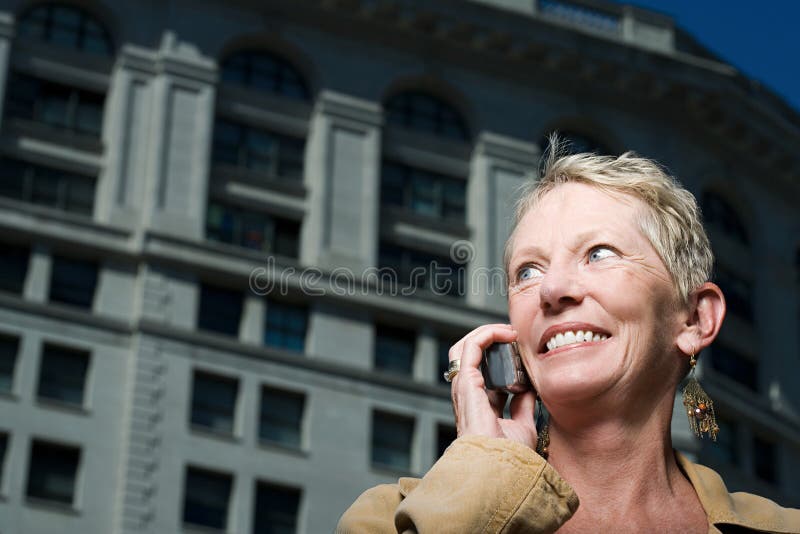 Woman on mobile phone royalty free stock images