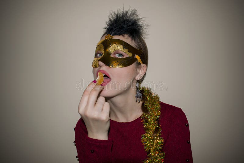 Woman model beauty, wearing Venetian masquerade carnival mask at the party. Celebrating Christmas and New Year. stock photo Woman model beauty, wearing Venetian masquerade carnival mask at the party. Celebrating Christmas and New Year. stock photo