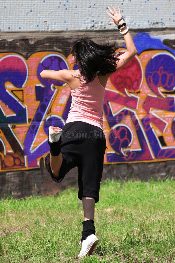 Woman modern dancer in city