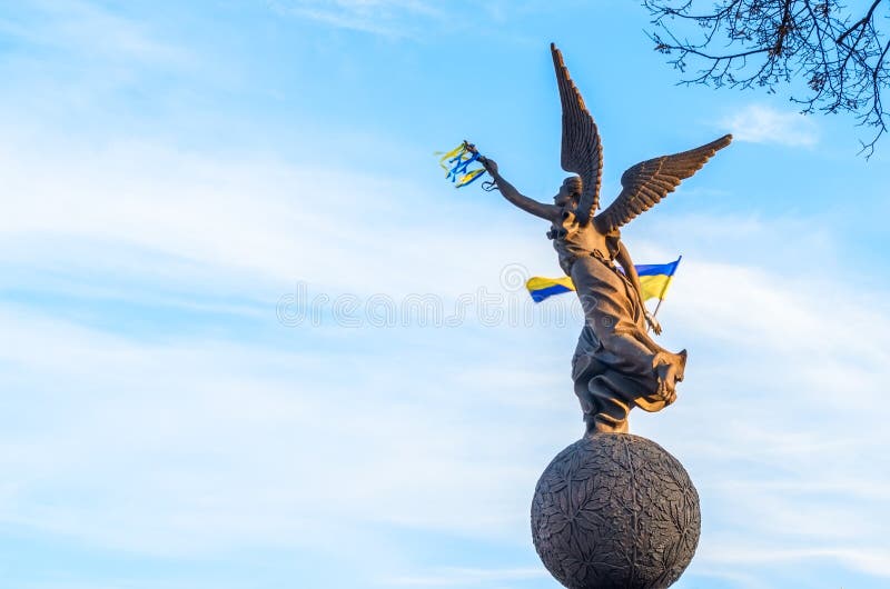 Woman monument with Ukraine flag royalty free stock image Woman monument with Ukraine flag royalty free stock image