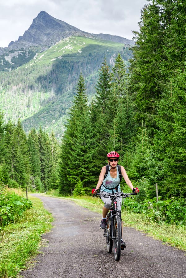 Woman on MTB bike in High Tatras mountains, Slovakia