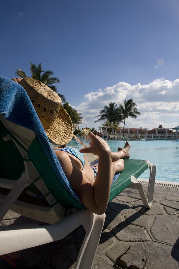 Woman near swimming pool in cuba