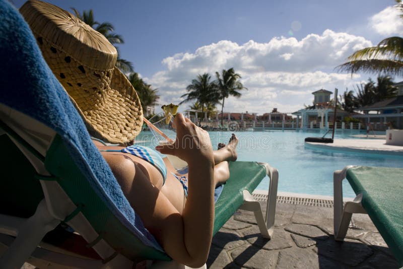 Woman near swimming pool in cuba