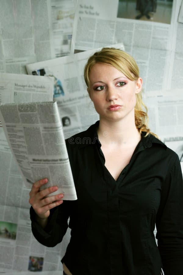 woman with newspaper