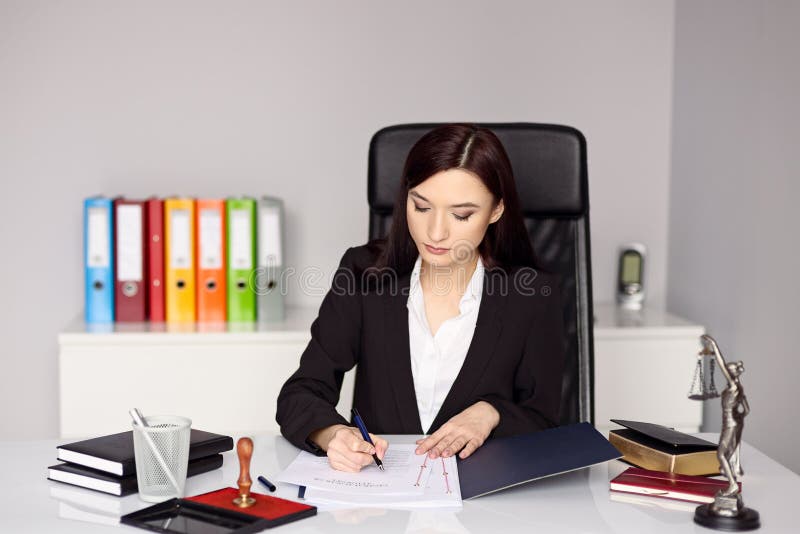 Woman notary public notarizes the power of attorney royalty free stock photos Woman notary public notarizes the power of attorney royalty free stock photos