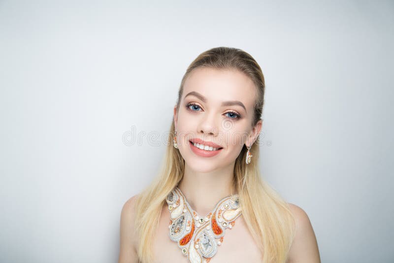 Woman nude make up massive necklace stock photography Woman nude make up massive necklace stock photography