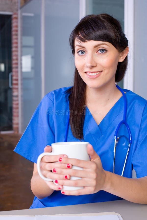 Woman Nurse Coffee stock photo. Image of girl, chart - 10735586
