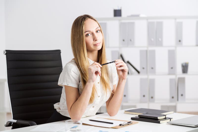 Woman at office desk stock image. Image of business, executive 70359749