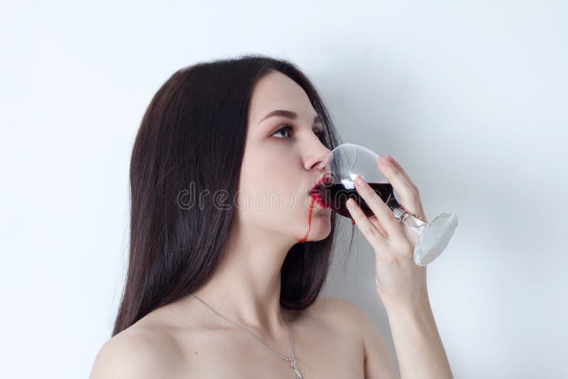 Woman with Open Eyes Drinking Wine, Which Runs on the Lips Stock Photo Image of glamor