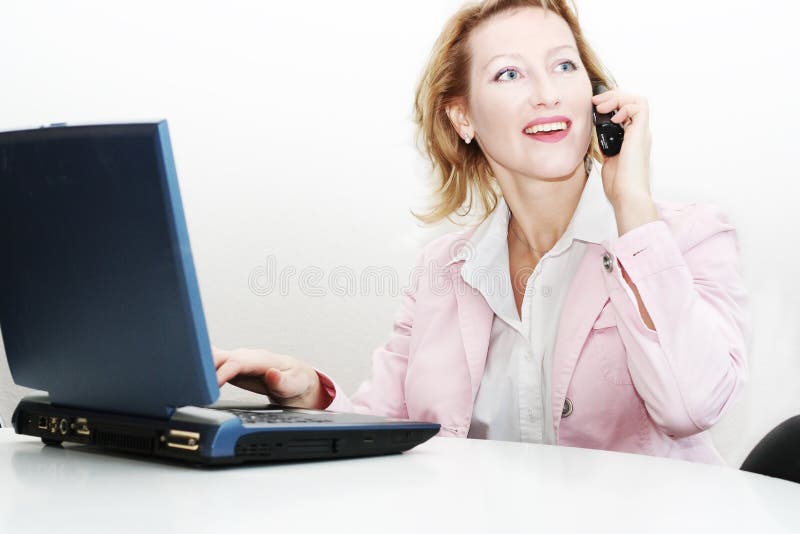 Woman operator phone with laptop