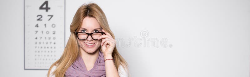 Woman in optician s office