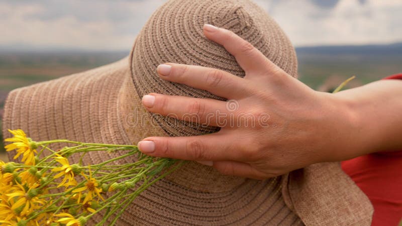 Woman on hill top, enjoying the view - close up