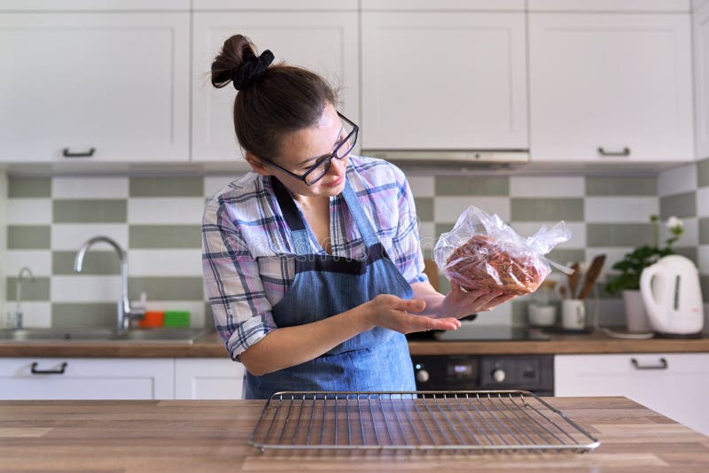 Sexy legs cooking in the kitchen